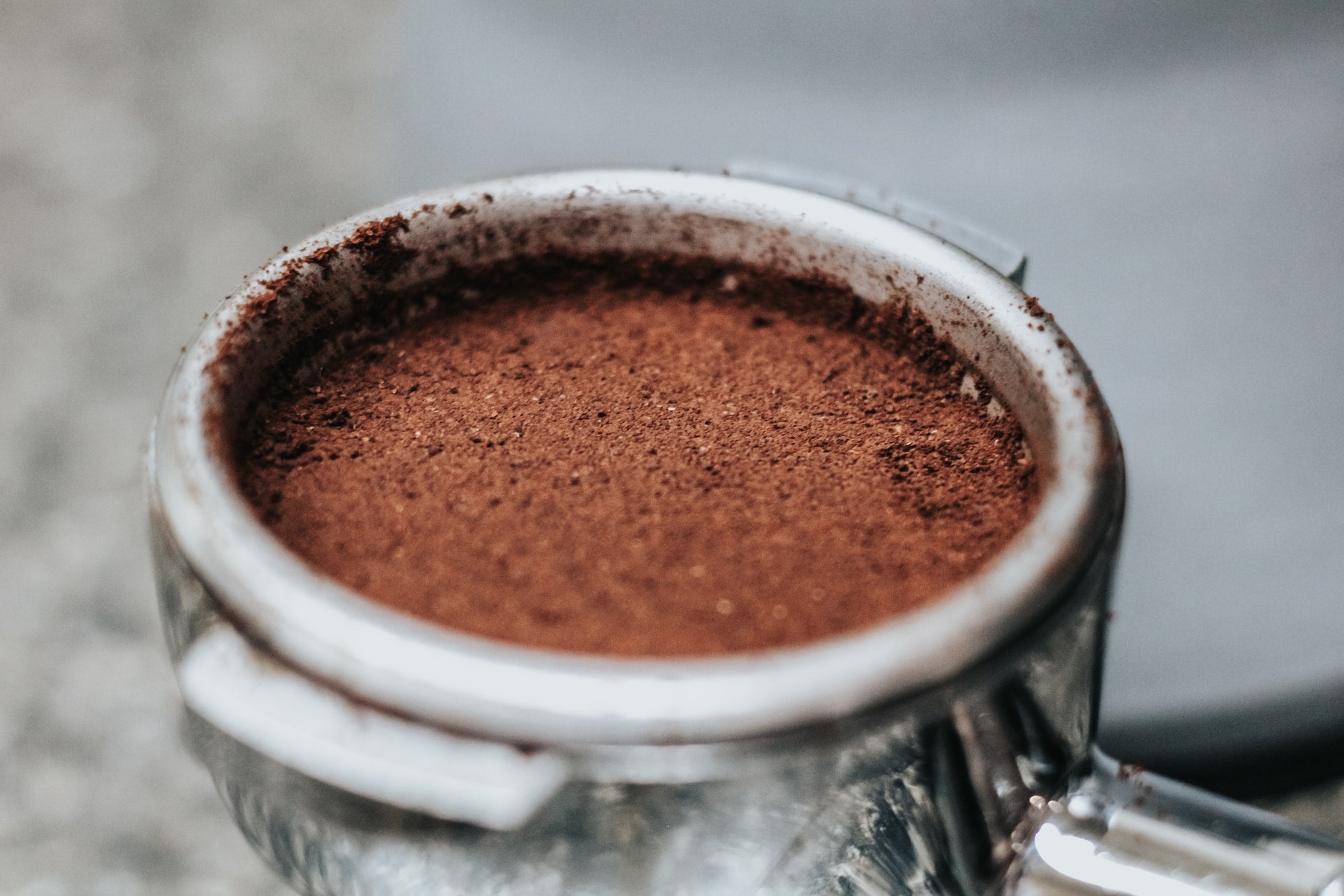 Is it safe to dispose of coffee grounds down the sink?